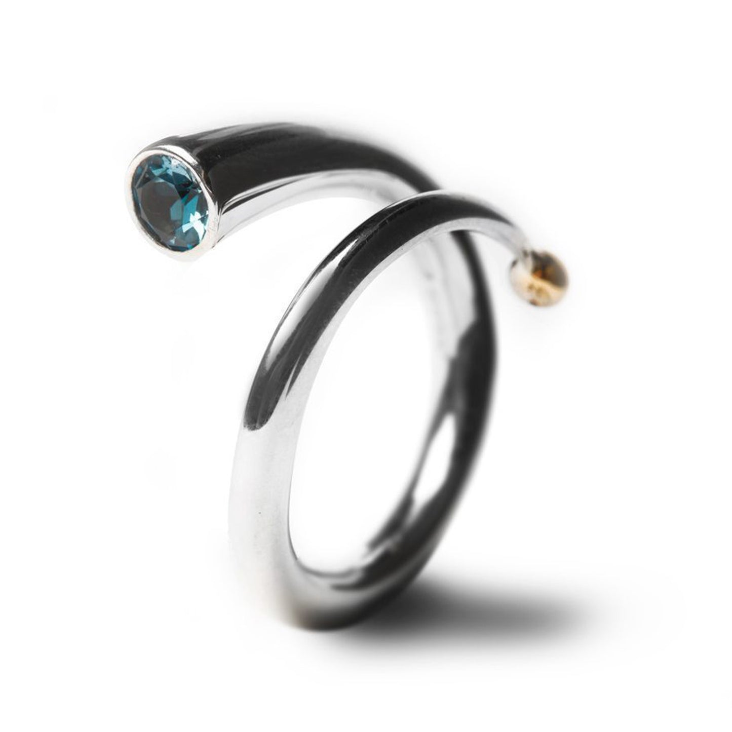 Silver and blue topaz spiral ring